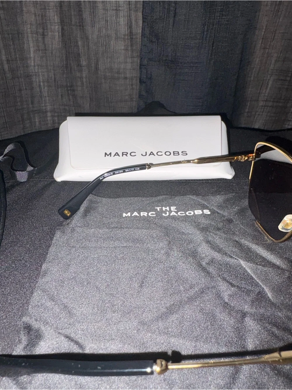 Marc Jacobs Gold Frame Sunglasses with Dark Lenses